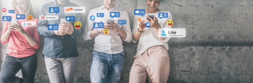 The image depicts a group of people, likely in a social or casual setting, all holding and using their smartphones. They are surrounded by various social media icons on the screen, suggesting a theme related to technology, connectivity, or digital communication.