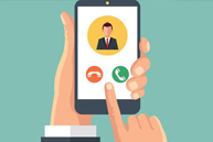 A hand holding a smartphone displaying a virtual meeting interface with a profile picture of a person and icons for video, audio, and sharing.