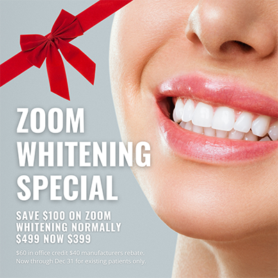 The image is an advertisement for a dental special offer, featuring a smiling woman with white teeth and a red ribbon around her neck, suggesting a festive or promotional occasion.