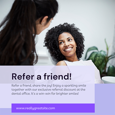 The image shows a woman sitting at a desk and smiling at the camera, with a text overlay that reads 'REFER A FRIEND! SHARE THE JOY OF SPARKLING SMILES WITH YOUR EXCLUSIVE REFERRAL DISCOUNT AT THE DENTAL OFFICE. IT'S A WIN-WIN FOR BRIGHTER SMILES!' The website address 'WWW.REALLYGREATSITE.COM' is also visible at the bottom of the image.